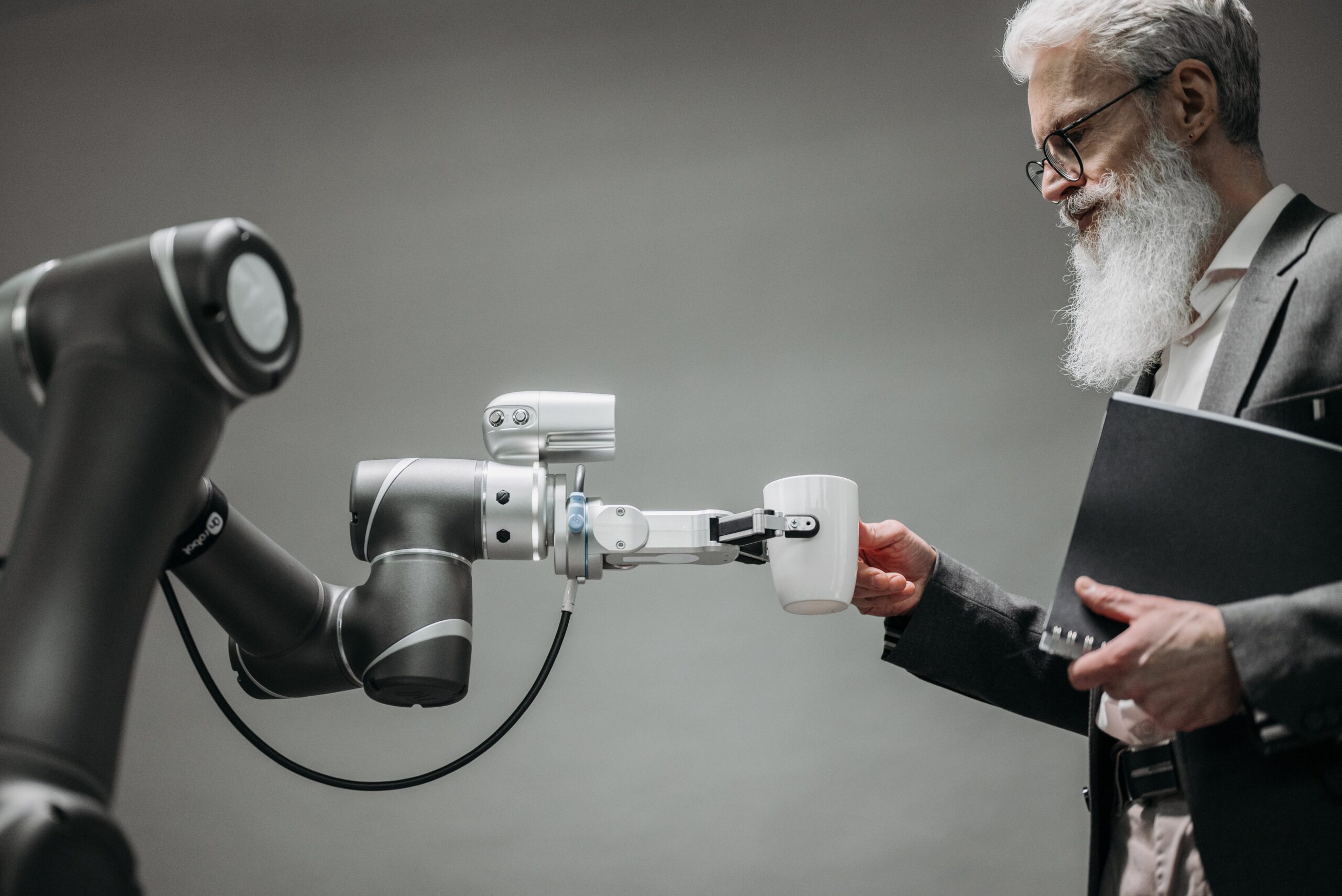 AI robot giving man a cup of coffee